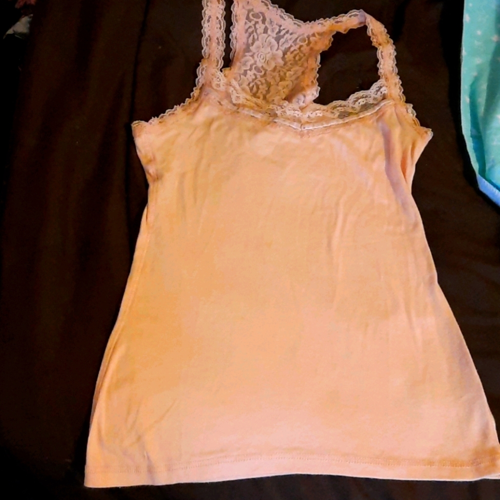Light pink tank top with lace up in front and back